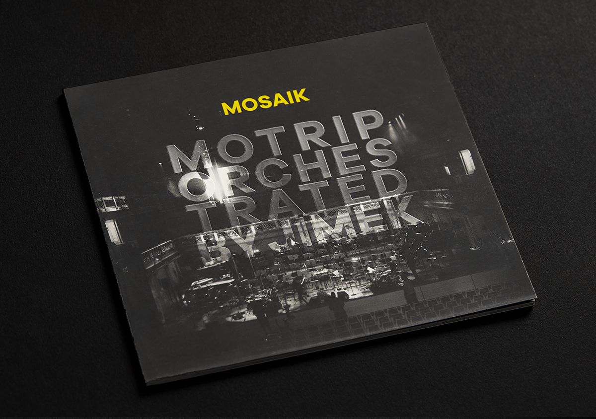 Mosaik motrip orchestrated by jimek album artwork konzerthaus CD booklet mit Cover und spotlack auf schwarzer oberflaeche gedreht